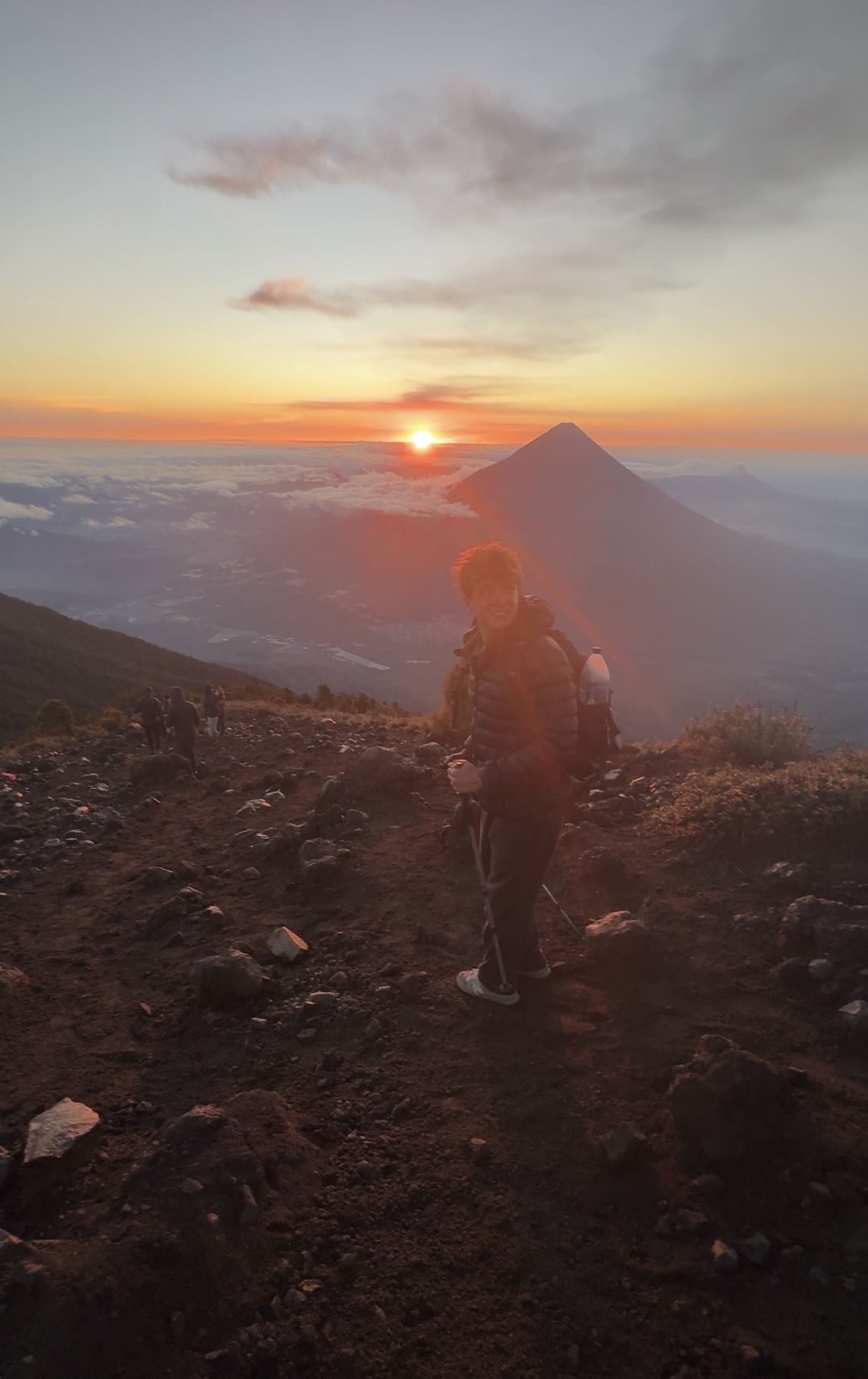 Walking the Acatenango trail at first light, volcano on the horizon